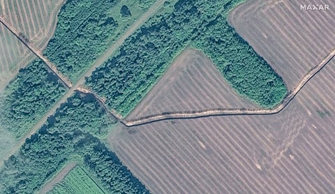 This image released by Maxar Technologies shows a trenchline southeast of Selektsionnyi, Russia, Monday Aug. 12, 2024